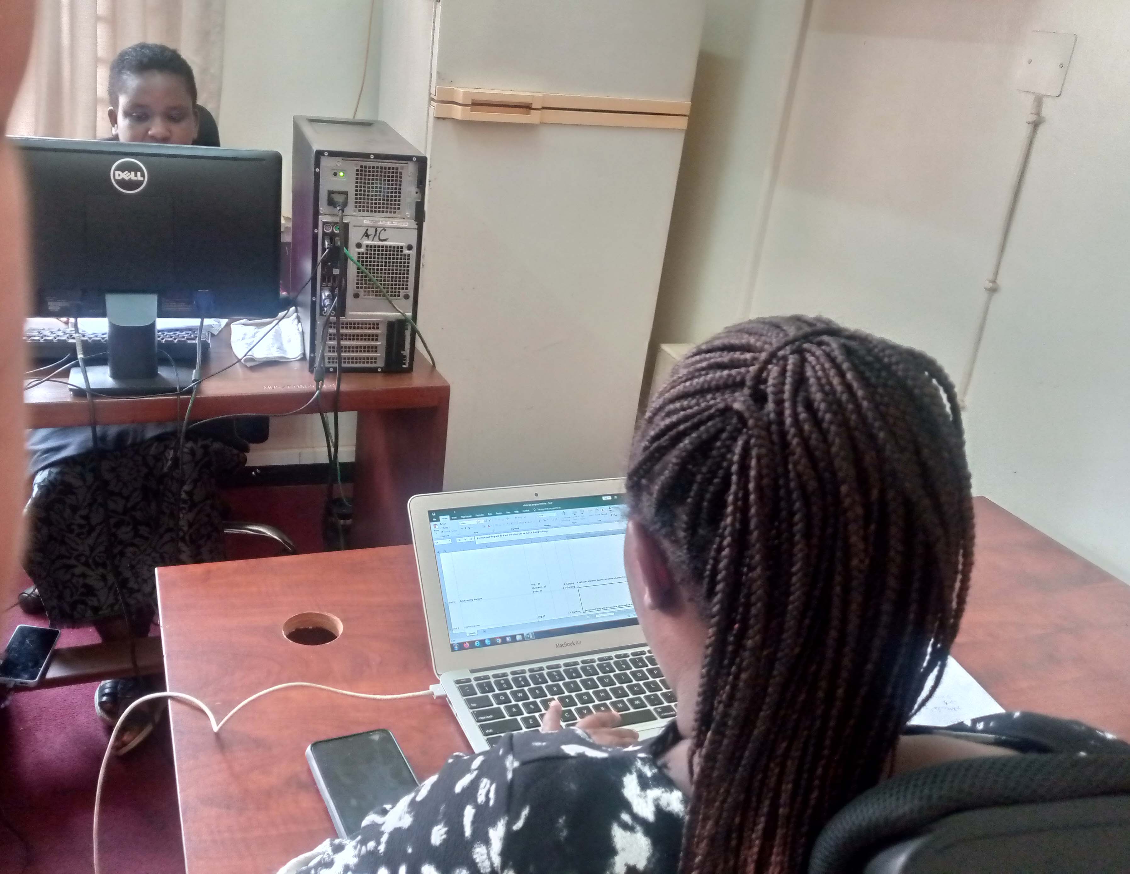 CHDC staff delivering SMS and WhatsApp messages to parents with disabilities, and those caring for children with disabilities