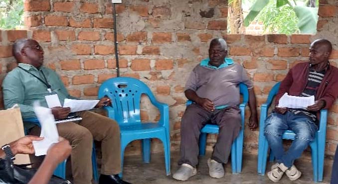 Scale and Capacity Development Officer, Mr. Hosea Katende Sempa, engages LC officials of Lwesubo Village in Wakiso District in a dialogue on the challenges of community mobilization and participation in parenting sessions